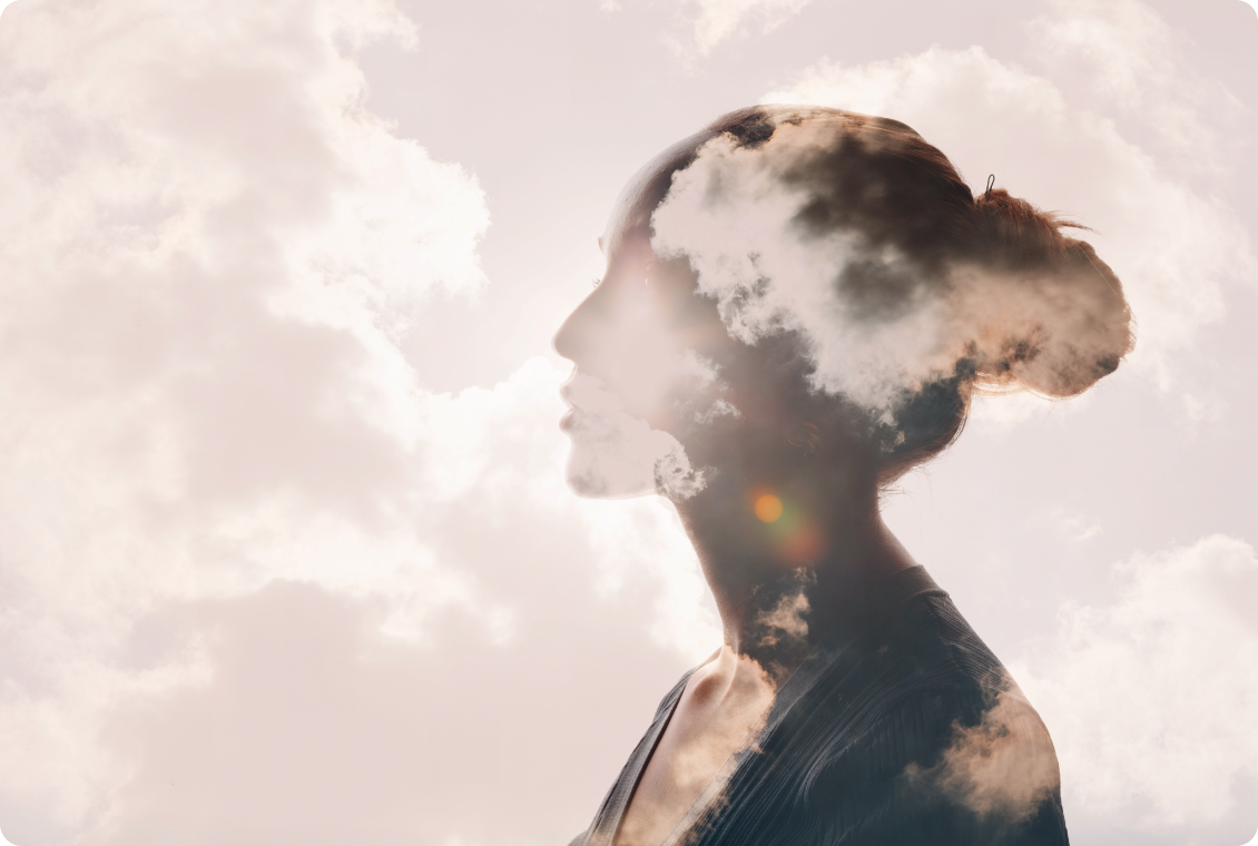 Dreamy portrait with cloud overlay